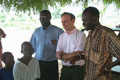 Photo of David Sahn and Leopold Sarr working on field test of education and health survey in Senegal